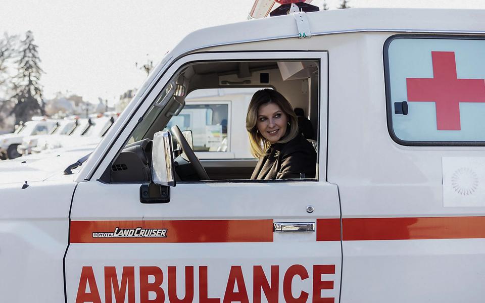 Ukraine's First Lady Olena Zelenska sits in an ambulance