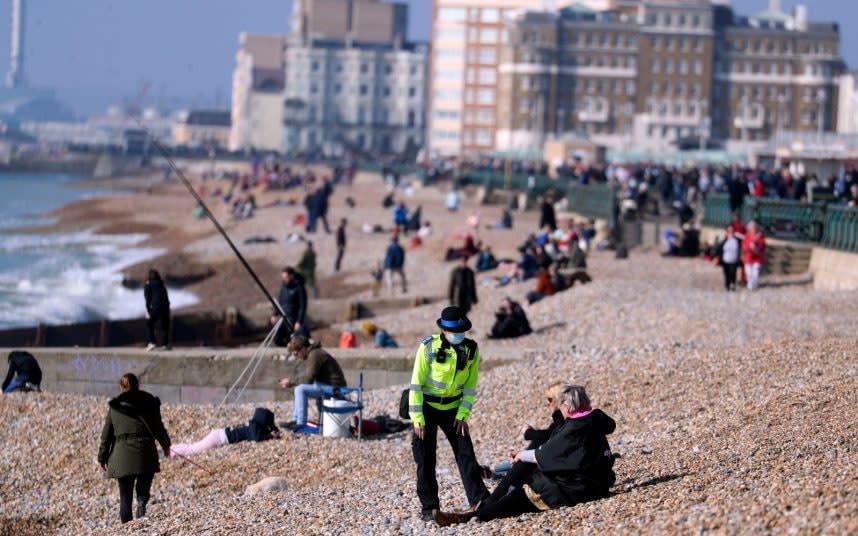 Police checked up on lockdown flouters during the weekend’s unseasonably warm weather   - PA