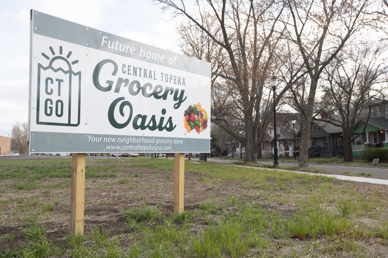 A sign on the corner of S.W. 12th St. and S.W. Washburn Ave. signifies the future home of a grocery store through the Central Topeka Grocery Oasis group.