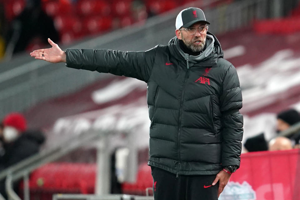 Jurgen Klopp and Liverpool sit atop the Premier League on goal difference, but they're also beset by injuries. (Photo by JON SUPER/POOL/AFP via Getty Images)