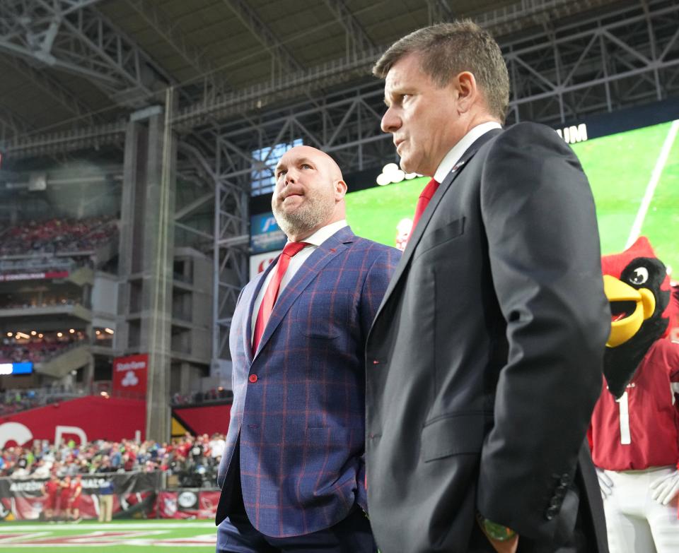 Jan 9, 2022; Glendale, Arizona, USA; Arizona Cardinals general manager Steve Keim (left) and owner Michael Bidwill watch the final minutes of their 38-30 loss against the Seattle Seahawks.