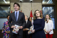 Canada's Prime Minister Justin Trudeau, from left, Deputy Prime Minister, Minister of Finance Chrystia Freeland and cabinet ministers pose for a photo before the tabling of the federal budget on Parliament Hill in Ottawa, Ontario, on Tuesday, April 16, 2024. (Justin Tang/The Canadian Press via AP)