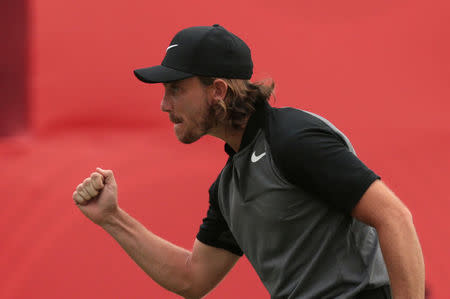 Golf - Abu Dhabi HSBC Golf Championship - Abu Dhabi, United Arab Emirates - 22/1/17 Tommy Fleetwood of Britain celebrates making a birdie on the 18th hole to finish -17 under par during the final round. REUTERS/Stringer