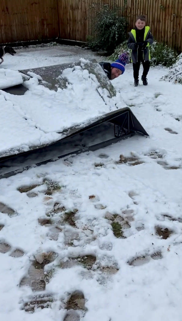 This is the moment a dad tried to cover his kids in snow from the top of his gazebo - only for it to completely collapse on top of him. Daniel Campbell, 34, tried to scrape off a bit of snow that had settled on the roof of the structure onto his kids Kacey, 15, Finley, 10, and Nate, seven, while wife Lucy, 34, filmed. But after failing to give them the shower he desired, his plan backfired and the gazebo collapsed on his head, leaving the whole family in hysterics.