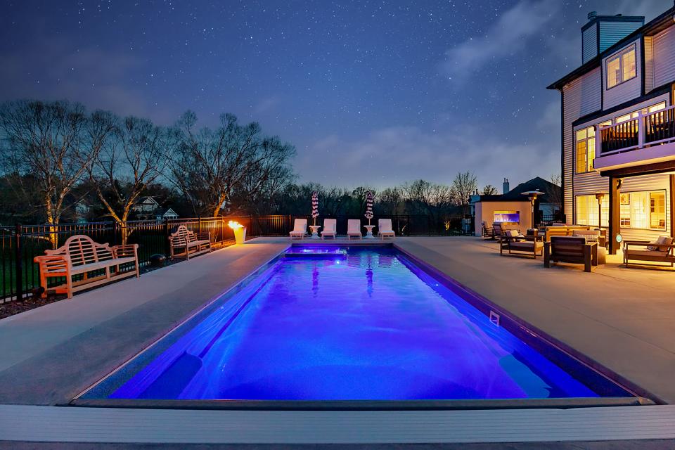 The saltwater pool glows in the evening.