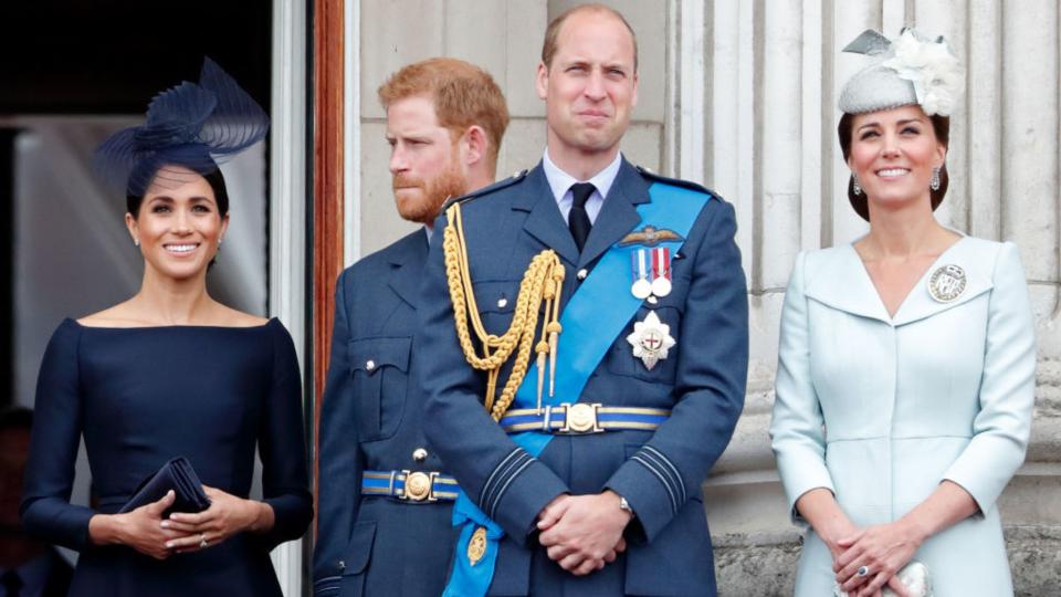 Meghan, Duchess of Sussex, Prince Harry, Duke of Sussex, Prince William, Duke of Cambridge and Catherine, Duchess of Cambridge watch a flypast to mark the centenary of the Royal Air Force from the balcony of Buckingham Palace on July 10, 2018 in London, England. The 100th birthday of the RAF, which was founded on on 1 April 1918, was marked with a centenary parade with the presentation of a new Queen's Colour and flypast of 100 aircraft over Buckingham Palace. (Photo by Max Mumby/Indigo/Getty Images)