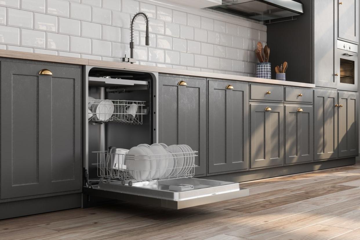 An image of a high-quality dishwasher in a fancy kitchen.