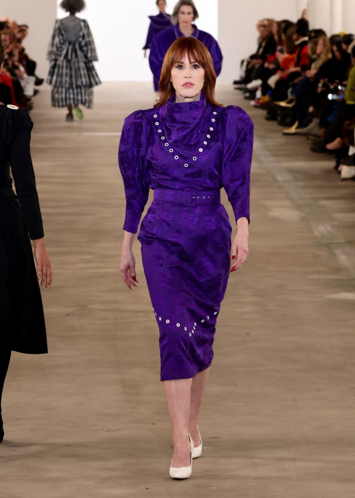 Ringwald graced the runway a second time in a brilliant purple number, a nod to her ’80s coming-of-age heyday. Getty Images for NYFW: The Shows