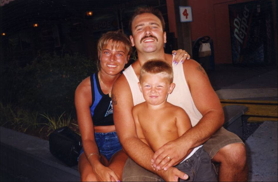 Jeana and James Burrus with their son.