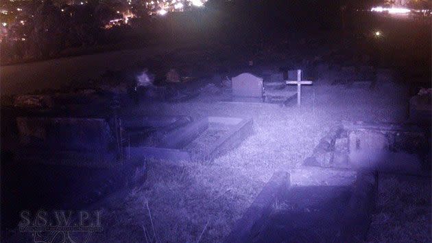 Another photo from the St Bart's Cemetery that shows a light sitting near a grave. Photo: Facebook