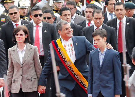 Ecuador's President Rafael Correa (C) arrives with his wife Anne Malherbe (L) and their son Miguel for the inauguration of President-elect Lenin Moreno (not pictured) at the National Assembly in Quito, Ecuador May 24, 2017. REUTERS/Henry Romero