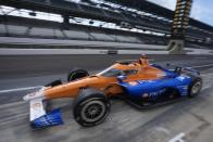 Scott Dixon, of New Zealand, leaves the pits during a practice session for the Indianapolis 500 auto race at Indianapolis Motor Speedway, Friday, May 17, 2024, in Indianapolis. (AP Photo/Darron Cummings)