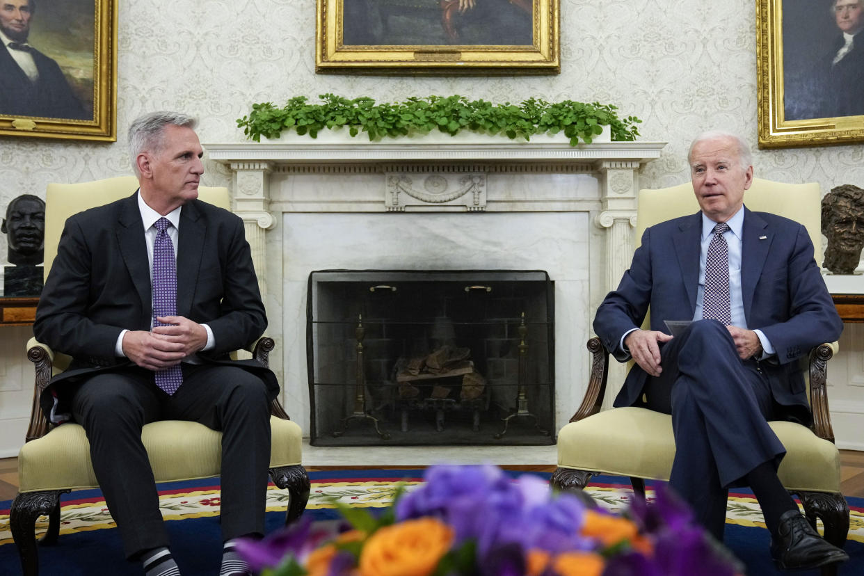 FILE - President Joe Biden meets with House Speaker Kevin McCarthy of Calif., to discuss the debt limit in the Oval Office of the White House, May 22, 2023, in Washington. The White House and congressional leaders are working to ensure passage in time to lift the nation’s borrowing limit and prevent a U.S. default. The full House is expected to vote Wednesday. Officials say the U.S. risks default June 5. (AP Photo/Alex Brandon, File)