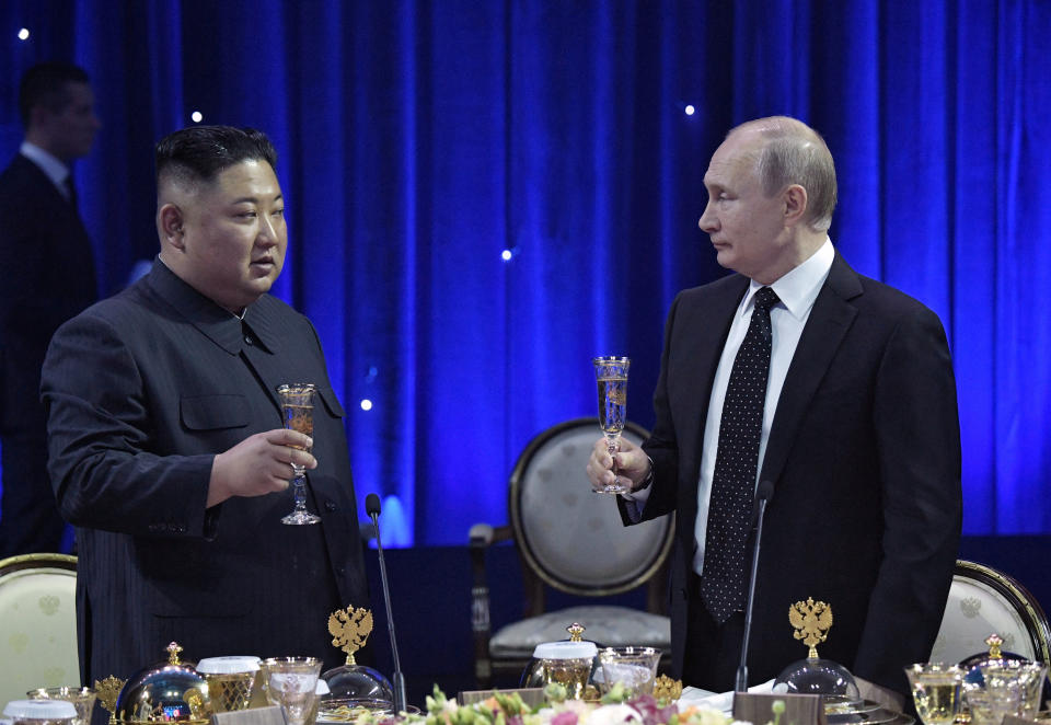 Russia's President Vladimir Putin (R) and North Korea's leader Kim Jong Un attend an official reception following their talks in Vladivostok, Russia April 25, 2019. Sputnik/Alexei Nikolsky/Kremlin via REUTERS ATTENTION EDITORS - THIS IMAGE WAS PROVIDED BY A THIRD PARTY. TPX IMAGES OF THE DAY