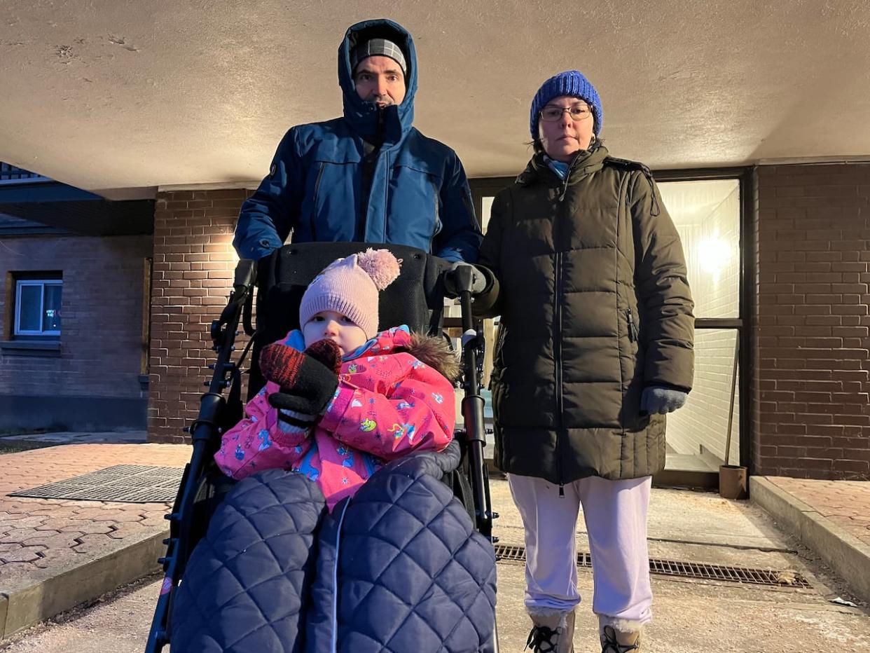 Mircei Alaman, left, and his wife Anca Alaman lost access to their home after a fire ravaged an apartment in the building where they live.  (Paula Dayan-Perez/CBC - image credit)