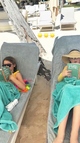 <p>Jenna Bush Hager/Instagram</p> Jenna Bush Hager's daughter Mila reading 'The Summer I Turned Pretty' with a friend on the beach