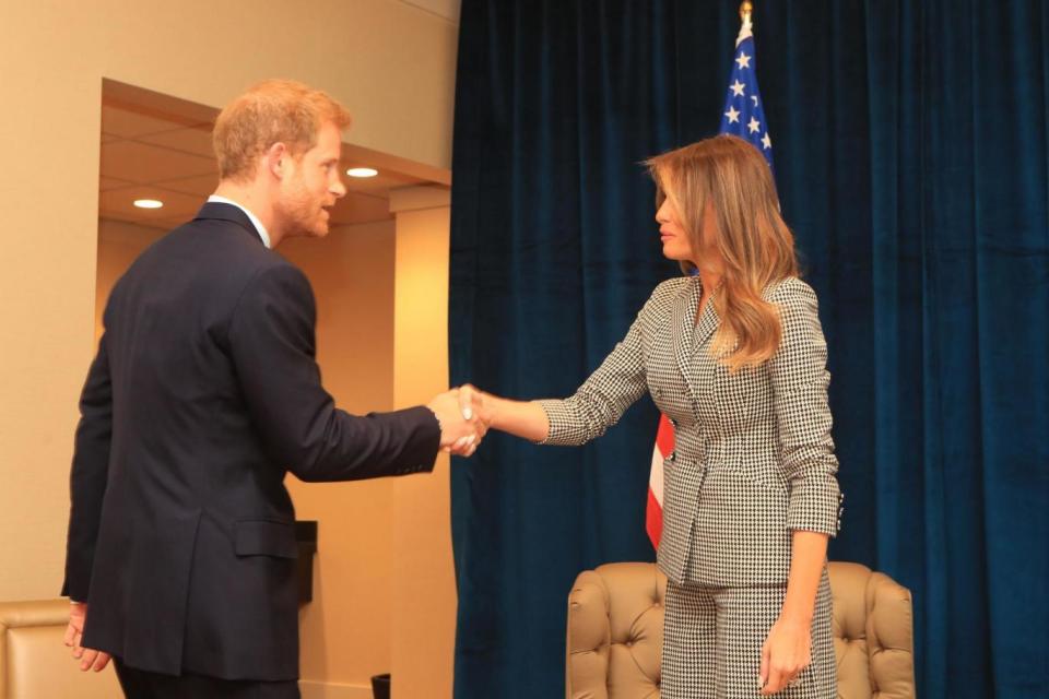 Prince Harry and US First Lady Melania Trump shake hands as they meet in Toronto (PA)