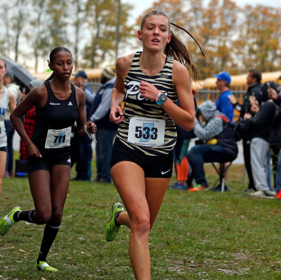 Penn senior Mary Eubank (533) competes in the girls cross country regional race Saturday, Oct. 21, 2023, at New Prairie High School in New Carlisle.