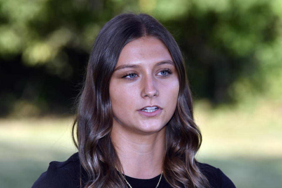 Hadley Duvall answers questions from a reporter during an interview in Versailles, Ky., Wednesday, Sept. 20, 2023. Duvall is featured in a campaign ad attacking Republican Daniel Cameron's long-held position on the abortion issue. (AP Photo/Timothy D. Easley)