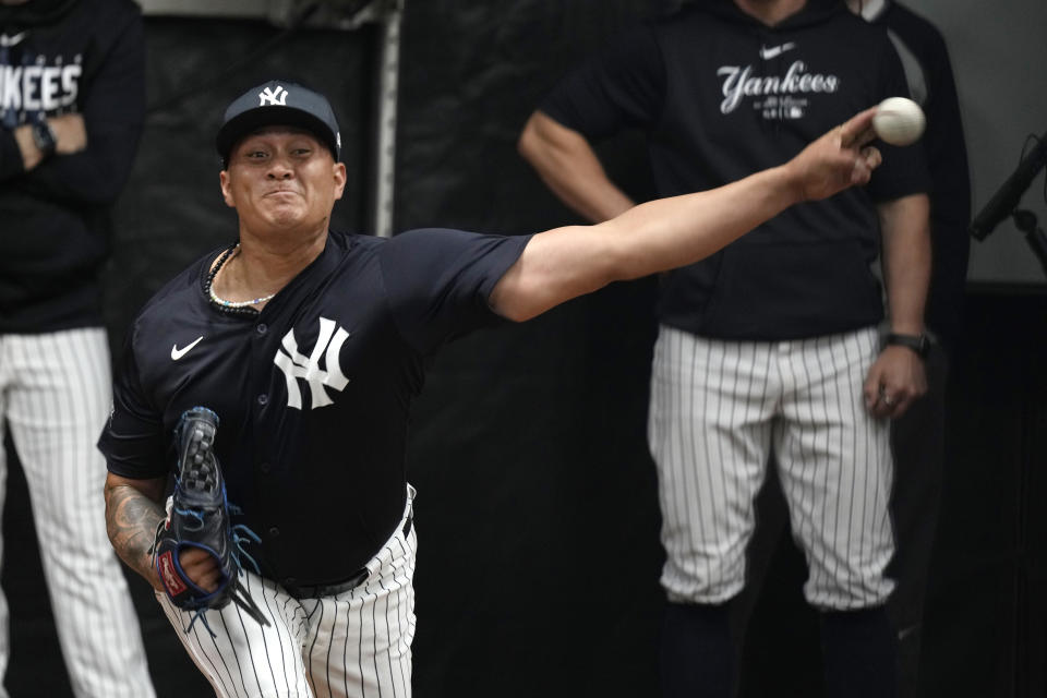 New York Yankees pitcher Victor Gonzalez throws during a baseball spring training workout Thursday, Feb. 15, 2024, in Tampa, Fla. (AP Photo/Charlie Neibergall)