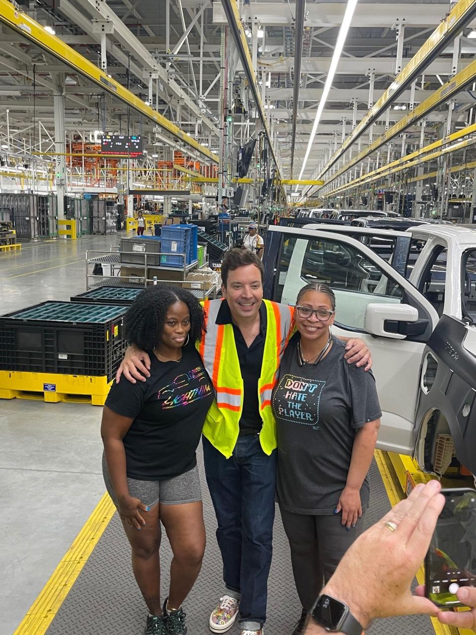 "The Tonight Show Starring Jimmy Fallon" host stopped by the Rouge Electric Vehicle Center in Dearborn on Friday, Aug. 5, 2022, and met UAW employees who build the all-electric F-150 pickup. He is pictured here with Kimberly Henderson and M’Beindu Lansana.