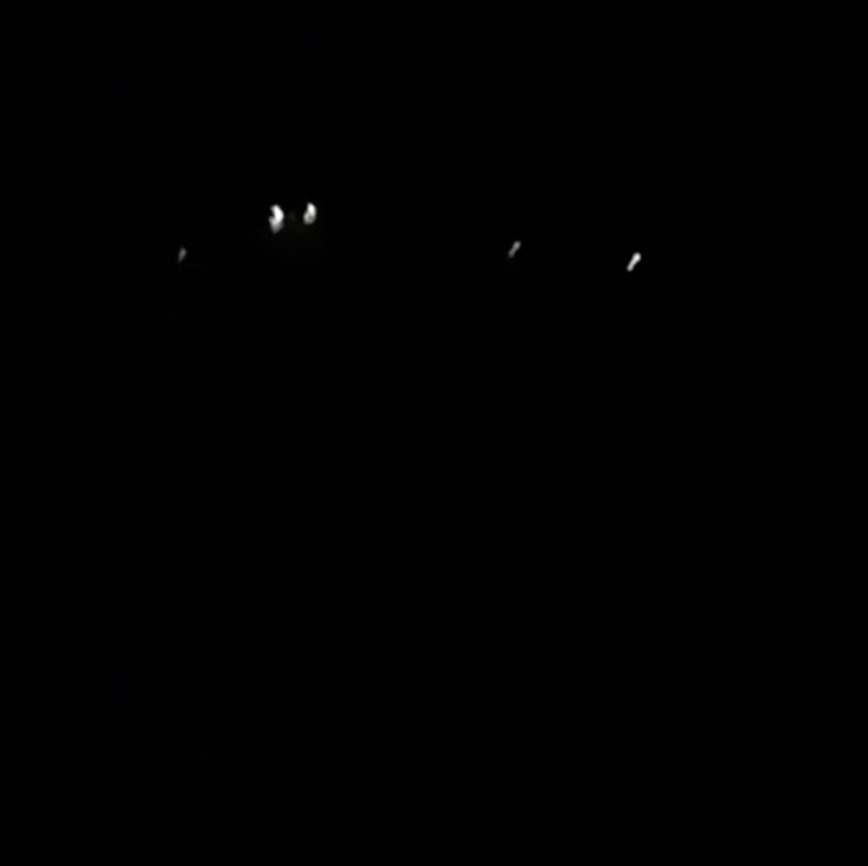 Six strange lights were spotted hovering in the night sky. Photo: Youtube