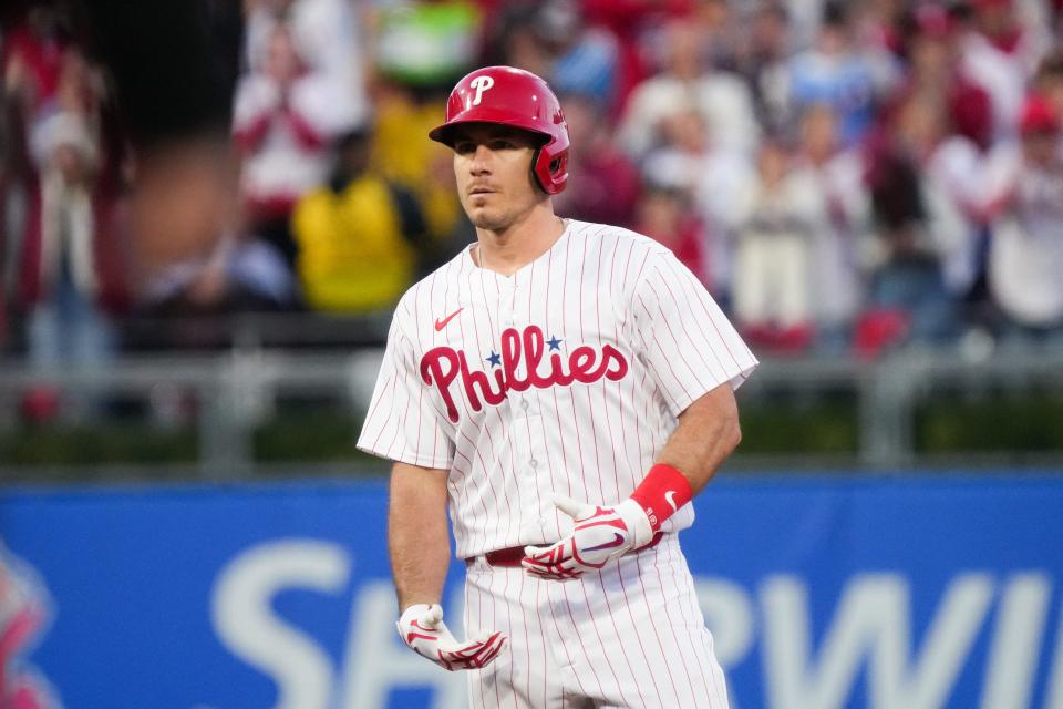 Philadelphia Phillies catcher J.T. Realmuto (10) reacts after hitting an RBI double during the second inning against the Arizona Diamondbacks in Game 6 of the NLCS at Citizens Bank Park on Oct. 23, 2023, in Philadelphia, PA. The Arizona Diamondbacks won Game 6 of the NLCS against the Philadelphia Phillies, 5-1.