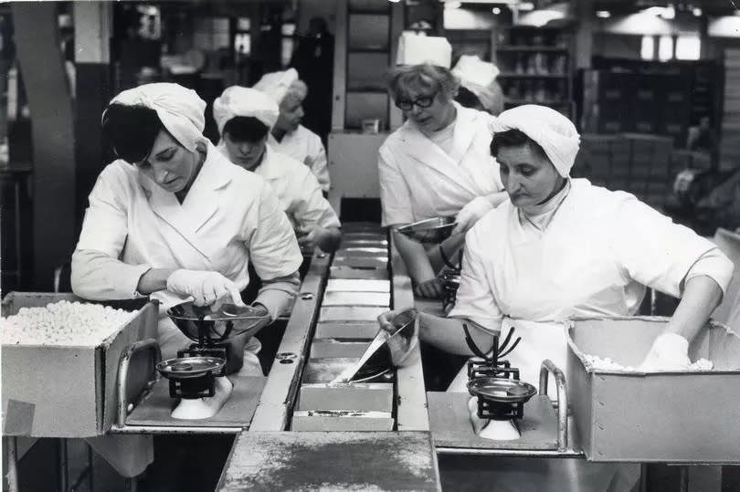 Staff are seen here in February 1971 at work on one of the new lines