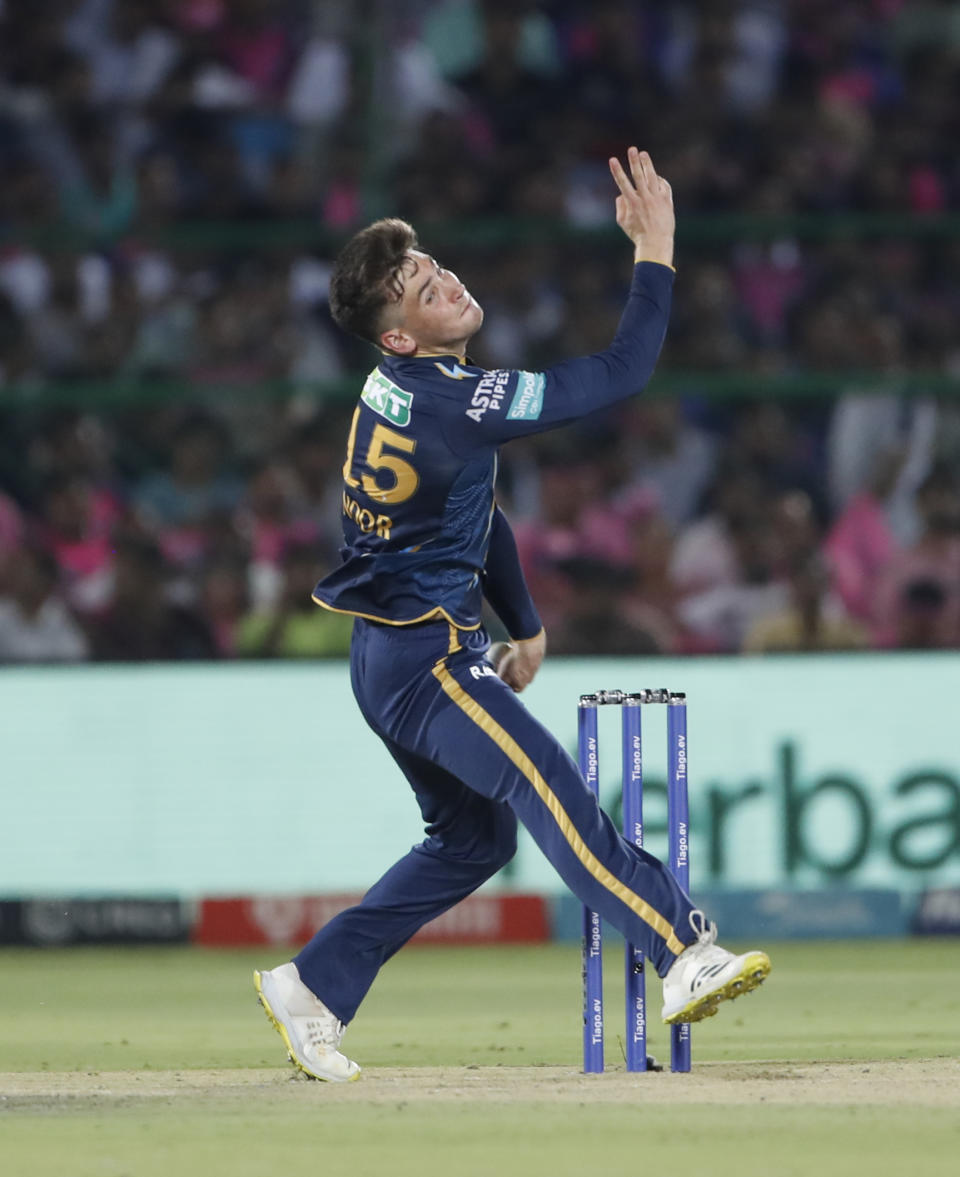 Gujarat Titans' Noor Ahmad bowls during the Indian Premier League (IPL)cricket match between Rajasthan Royals and Gujarat Titans in Jaipur, India, Friday, May 5, 2023. (AP Photo/Surjeet Yadav)