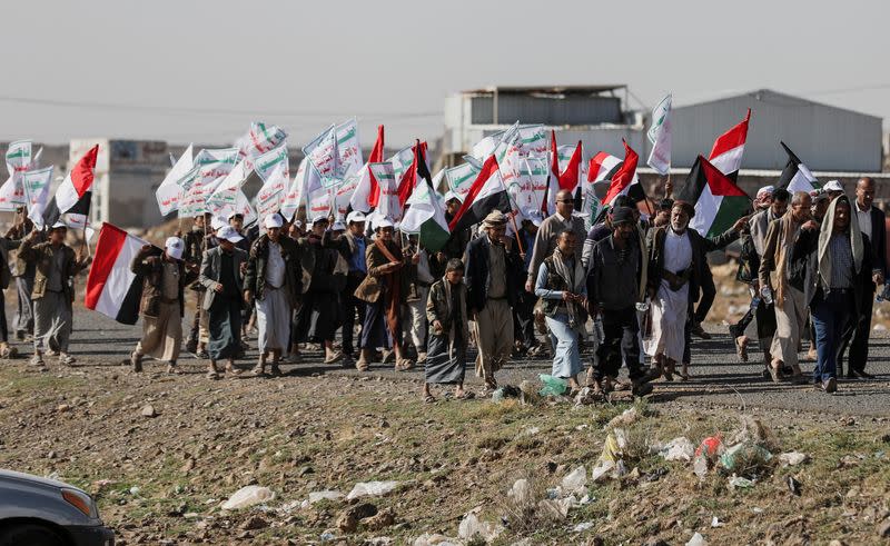 Houthi tribesmen gather to show defiance after U.S. and U.K air strikes on Houthi positions near Sanaa