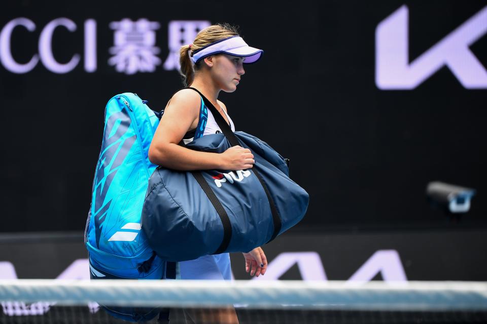 Sofia Kenin of the US leaves after losing against Estonia's Kaia Kanepi during their women's singles match on day four of the Australian Open tennis tournament in Melbourne on February 11, 2021. (Photo by William WEST / AFP) / -- IMAGE RESTRICTED TO EDITORIAL USE - STRICTLY NO COMMERCIAL USE -- (Photo by WILLIAM WEST/AFP via Getty Images)