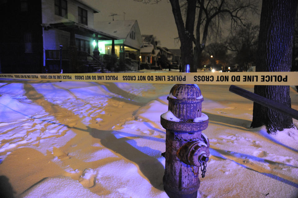 Police tape prevents pedestrians from walking down Tuxedo Street, where a four year old boy was shot with a rifle on Thursday, Jan. 16, 2014 in Detroit. A 4-year-old girl accidentally shot her 4-year-old cousin to death with a loaded rifle that she found under a bed at their grandfather's Detroit home, police said Friday. The girl was playing and watching TV on Thursday afternoon with the 4-year-old boy and his 5-year-old sister when she found the gun, police Sgt. Michael Woody said. He said she picked up the weapon, pointed it at the boy and shot him once in the chest. (AP Photo/Detroit News, Jose Juarez) DETROIT FREE PRESS OUT; HUFFINGTON POST OUT