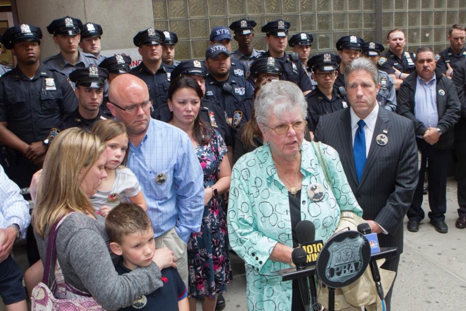 Marge Dwyer and family members of NYPD officer Anthony Dwyer, speak to reporters after attending a previous parole hearing of his killer Eddie Matos. William Farrington