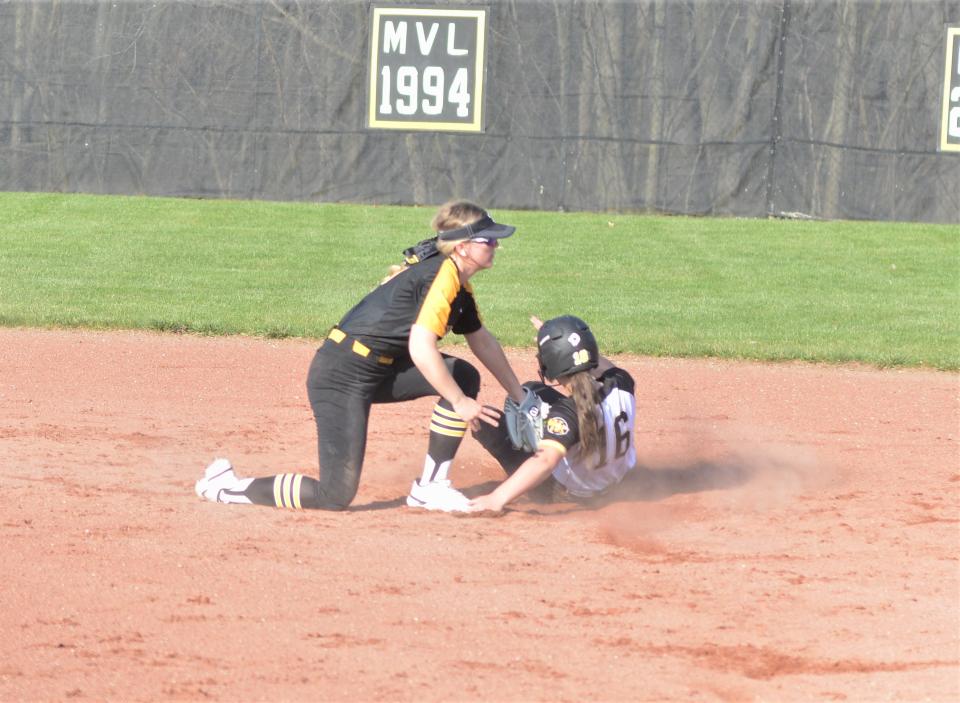 Tri-Valley shortstop Caity Journey tags out Watkins Memorial's Christina Kilkenny trying to steal second during Tuesday's game at Kenny Wolford Park.