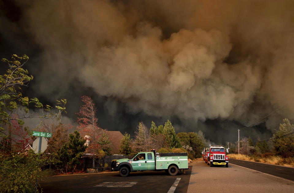 <p>The Camp Fire rages through Paradise, Calif., on Thursday, Nov. 8, 2018.<br>Tens of thousands of people fled a fast-moving wildfire Thursday in Northern California, some clutching babies and pets as they abandoned vehicles and struck out on foot ahead of the flames that forced the evacuation of an entire town.<br>(Photo from Noah Berger, AP) </p>