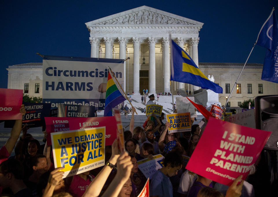 <p>Pro-choice and anti-abortion protesters demonstrate in front of the U.S. Supreme Court on July 9, 2018 in Washington, D.C. (Photo: Tasos Katopodis/Getty Images) </p>