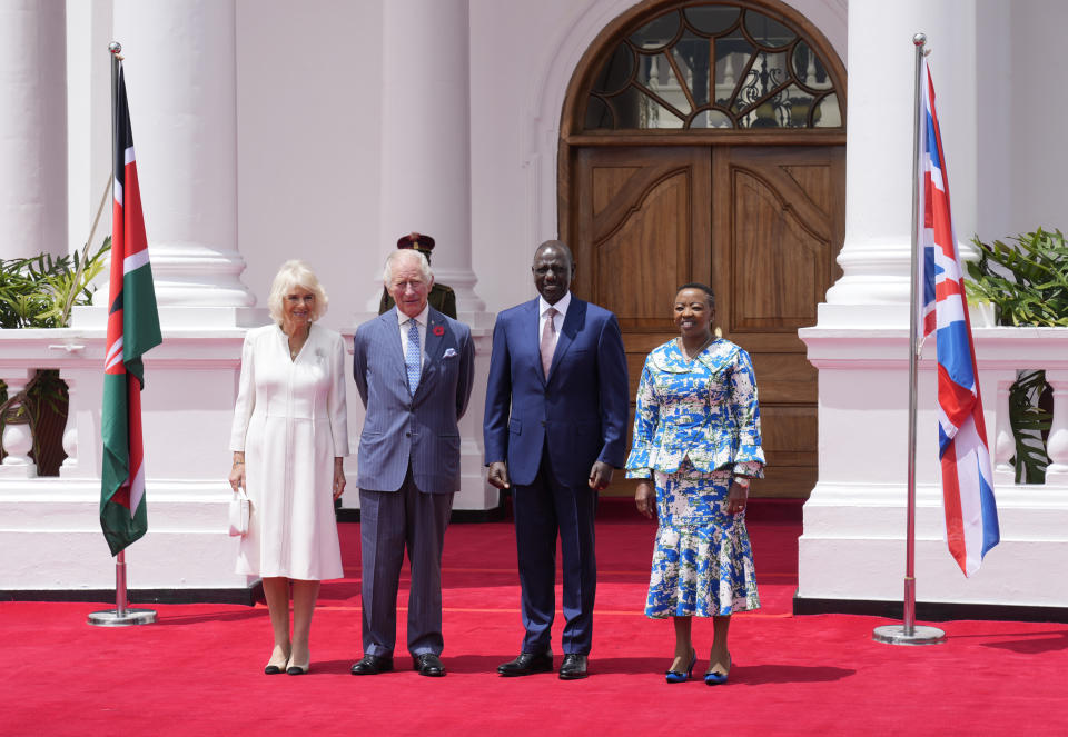 Britain's King Charles III, center, left, and Queen Camilla, left, pose for photo with Kenya's President William Ruto and First Lady Rachel Ruto ahead of their meeting, at State House in Nairobi, Kenya Tuesday, October 31, 2023. King Charles III is in Kenya for a four-day trip, his first state visit to a Commonwealth country as monarch, underscoring his commitment to an organization that's been central to Britain’s global power and prestige since World War II. (AP Photo/Khalil Senosi)