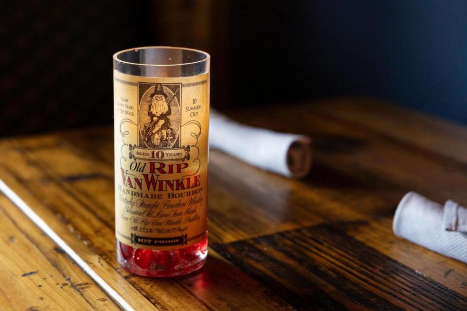 The Obstinate Sons has candle holders made from special bourbon bottles including Old Rip Van Winkle. Silas Walker/swalker@herald-leader.com