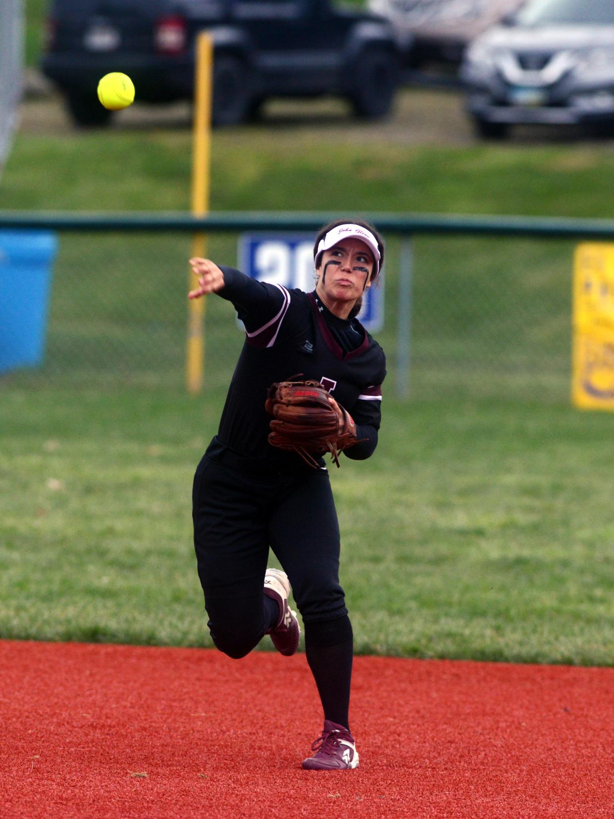 John Glenn shortstop Hannah Bendle makes a throw to first base during action last season at the Philo Athletic Complex. Bendle and the talented Lady Muskies return looking for a third straight OHSAA postseason run this season.