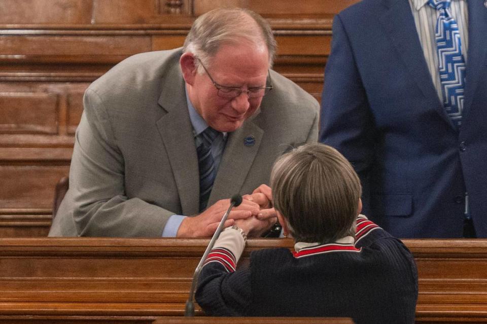 Kansas House Speaker Daniel Hawkins greets Kansas Governor Laura Kelly before the State of the State address at the Kansas State Capitol on Jan. 10, 2024. Hawkins said if Kelly tries to expand Medicaid on her own, the Legislature will take her to court.