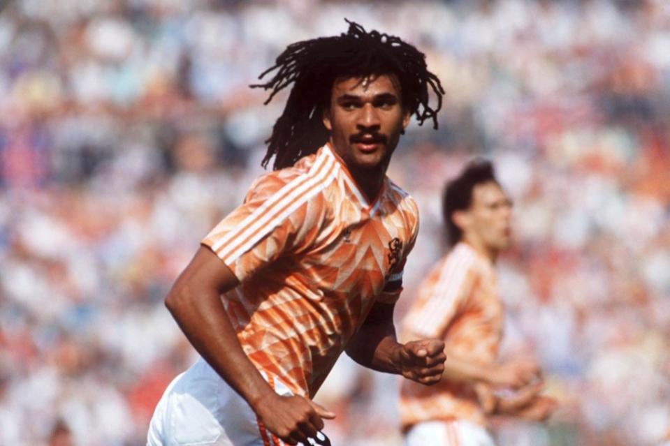 Ruud Gullit playing for Netherlands at the 1988 Europen Championship, wearing an orange football shirt.