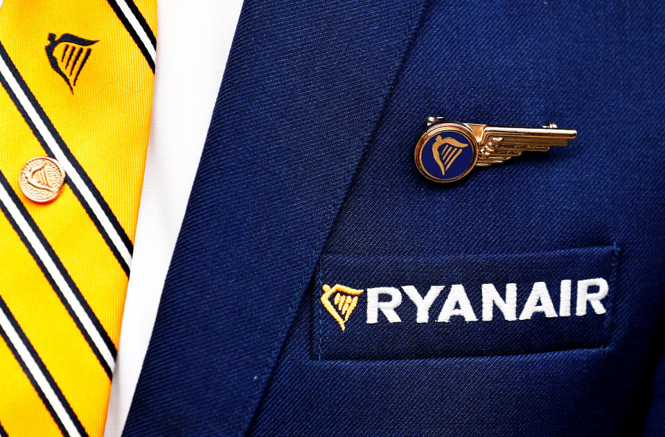 Ryanair logo is pictured on the the jacket of a cabin crew member ahead of a news conference by Ryanair union representatives in Brussels, Belgium September 13, 2018. Photo: REUTERS/Francois Lenoir