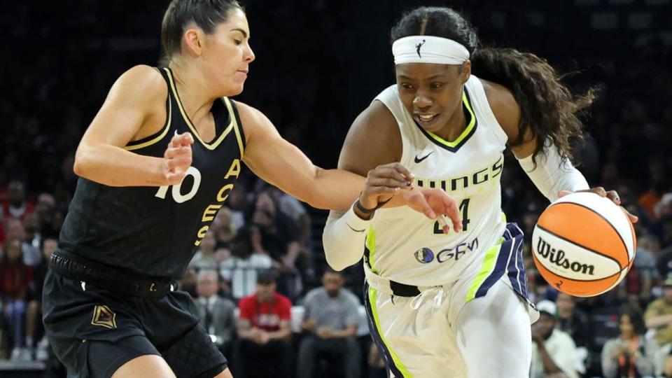 <div>LAS VEGAS, NEVADA - SEPTEMBER 26: <a class="link " href="https://sports.yahoo.com/wnba/players/6022/" data-i13n="sec:content-canvas;subsec:anchor_text;elm:context_link" data-ylk="slk:Arike Ogunbowale;sec:content-canvas;subsec:anchor_text;elm:context_link;itc:0">Arike Ogunbowale</a> #24 of the Dallas Wings drives against <a class="link " href="https://sports.yahoo.com/wnba/players/5787/" data-i13n="sec:content-canvas;subsec:anchor_text;elm:context_link" data-ylk="slk:Kelsey Plum;sec:content-canvas;subsec:anchor_text;elm:context_link;itc:0">Kelsey Plum</a> #10 of the <a class="link " href="https://sports.yahoo.com/wnba/teams/las-vegas/" data-i13n="sec:content-canvas;subsec:anchor_text;elm:context_link" data-ylk="slk:Las Vegas Aces;sec:content-canvas;subsec:anchor_text;elm:context_link;itc:0">Las Vegas Aces</a> in the second quarter of Game Two of the 2023 WNBA Playoffs semifinals at Michelob ULTRA Arena on September 26, 2023 in Las Vegas, Nevada. The Aces defeated the Wings 91-84. (Photo by Ethan Miller/Getty Images)</div>