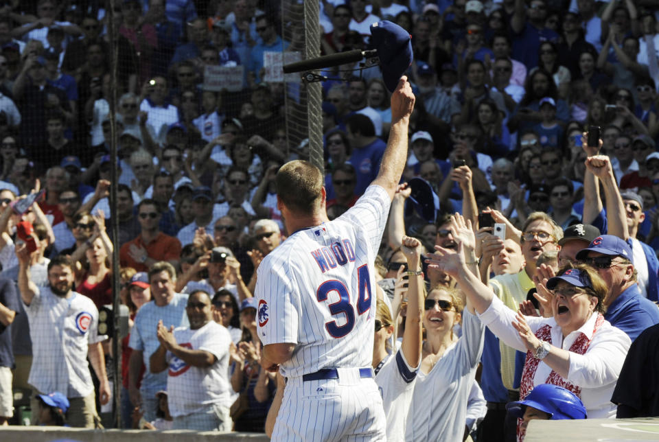 CHICAGO, IL - MAY 18: Kerry Wood #34 of the Chicago Cubs waves to fans after leaving the game against the Chicago White Sox on May 18 2012 at Wrigley Field in Chicago, Illinois. inning. It was announced that Kerry Wood is retiring from baseball today. (Photo by David Banks/Getty Images)