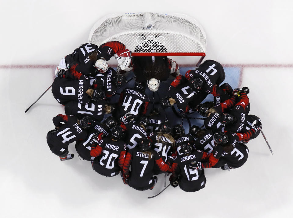 <p>Players from Canada gather before the preliminary round of the women’s hockey game against Finland at the 2018 Winter Olympics in Gangneung, South Korea, Tuesday, Feb. 13, 2018. (AP Photo/Matt Slocum) </p>