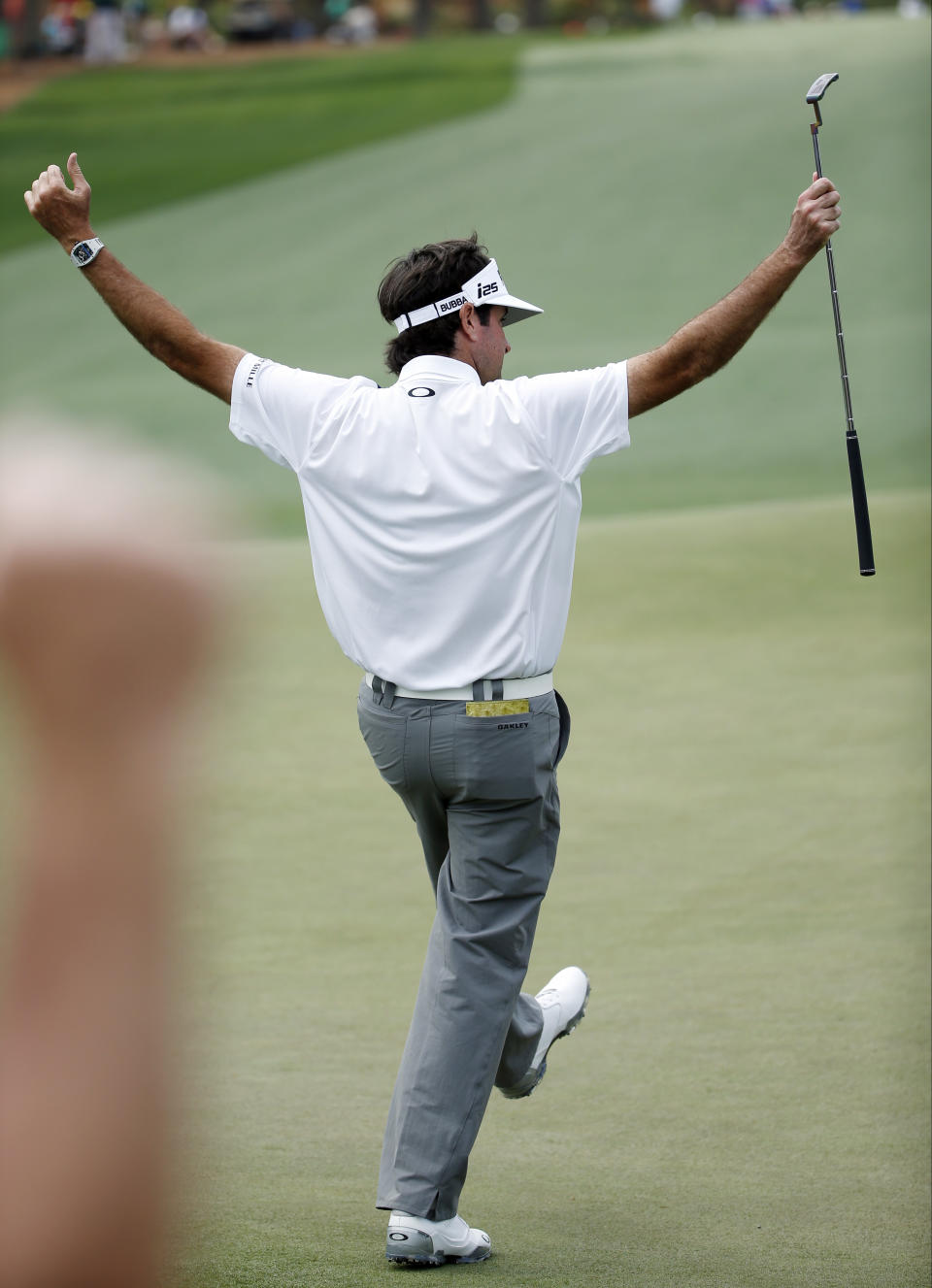 Bubba Watson celebrates after a birdie on the 14th green during the second round of the Masters golf tournament Friday, April 11, 2014, in Augusta, Ga. (AP Photo/Matt Slocum)