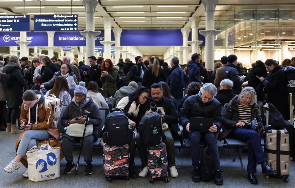 Passengers wait at the Eurostar terminal at St Pancras International as an unexpected strike held up travel plans (REUTERS)