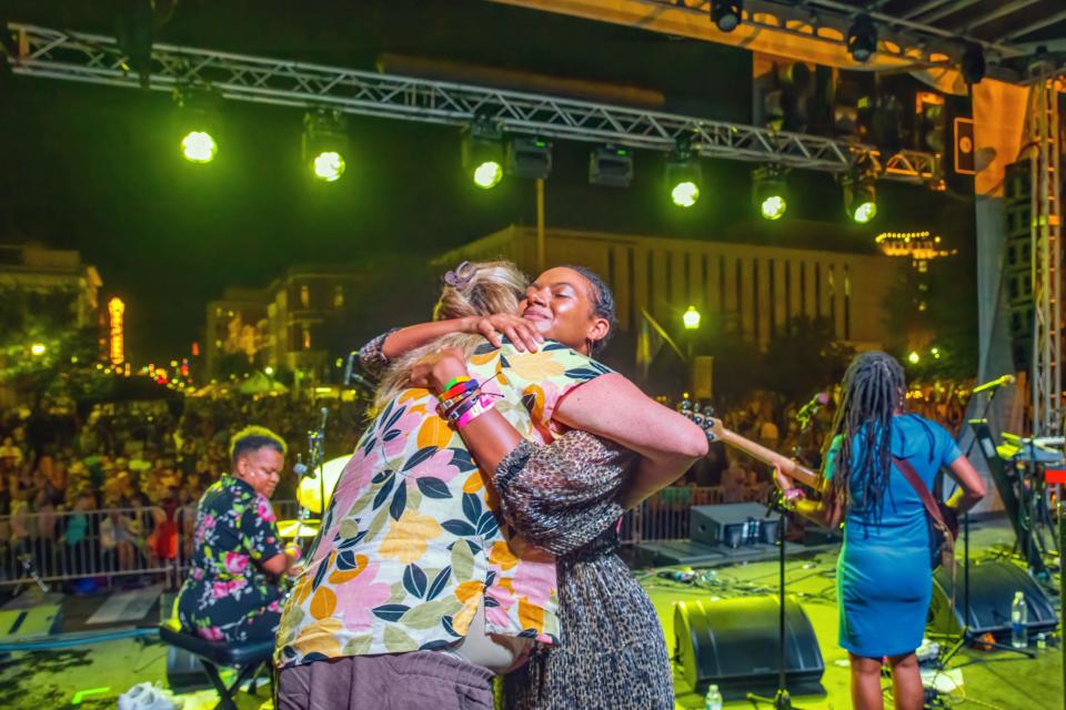 Allison Russell embraces Gloria Johnson onstage at Bristol Rhythm and Roots Reunion Festival, Sept. 9, 2023