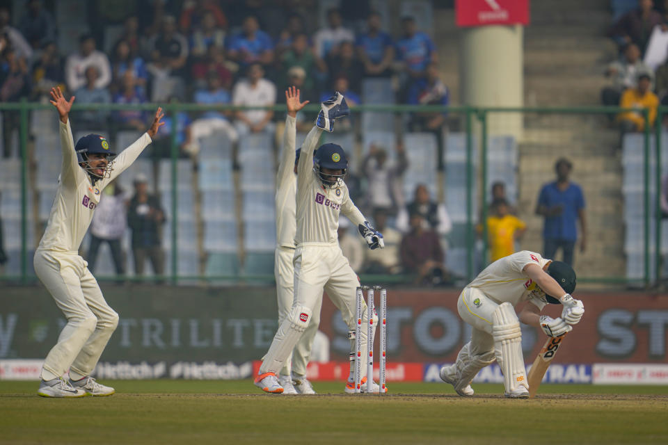 Indian players appeals unsuccessfully for LBW against Australia's David Warner, right, during the first day of the second cricket test match between India and Australia in New Delhi, India, Friday, Feb. 17, 2023. (AP Photo/Altaf Qadri)