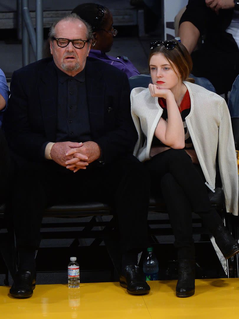 El actor junto a su hija, disfrutando de un partido de Los Angeles Lakers, en 2014